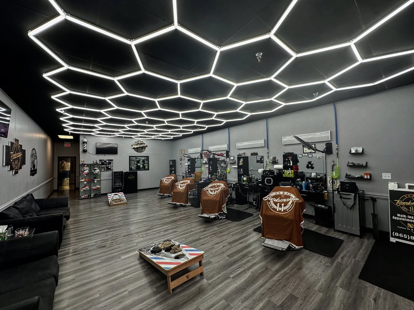 Barber chairs and workstations inside Barbershop 11